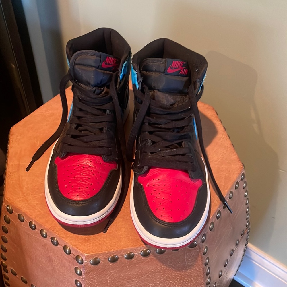 Air Jordan’s. Black, blue, and red.